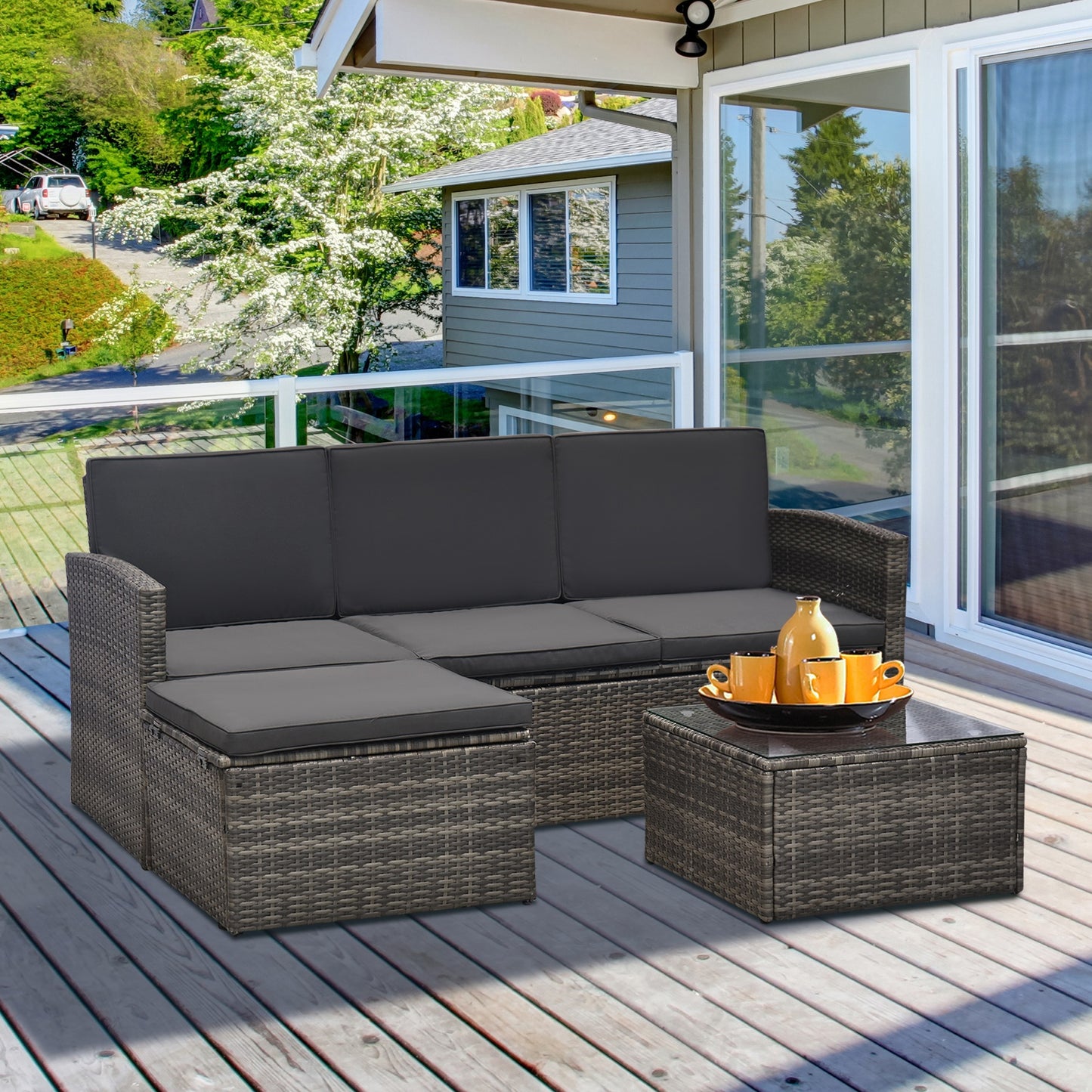 Outsunny 3 Pieces Outdoor PE Rattan Corner Sofa Set with Thick Cushions, Patio Rattan Garden Furniture with Glass Top Coffee Table and Footstool, Grey